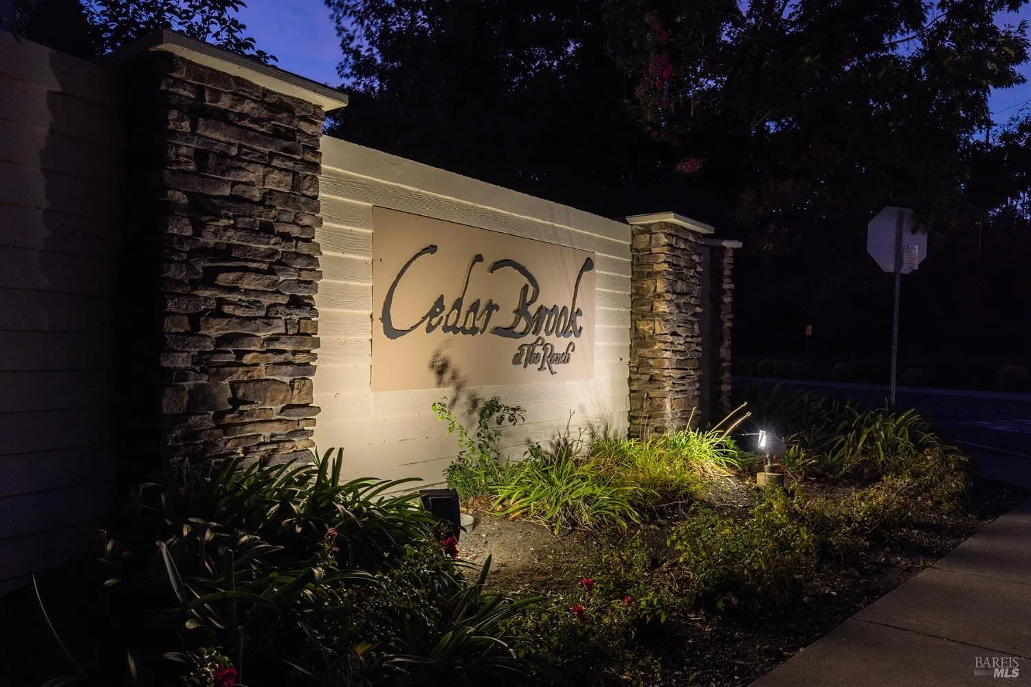Illuminated Cedar Brook at The Ranch community entrance sign