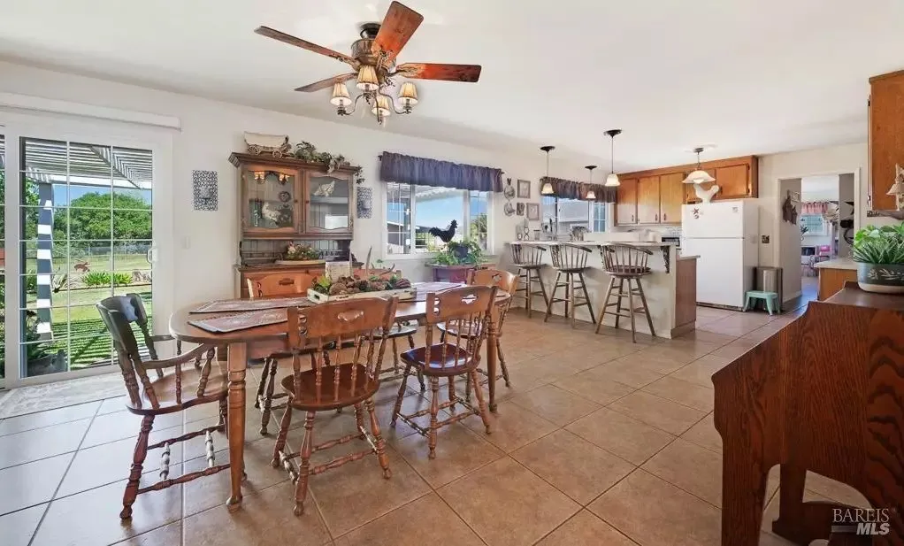 Dining area open to the kitchen and breakfast bar