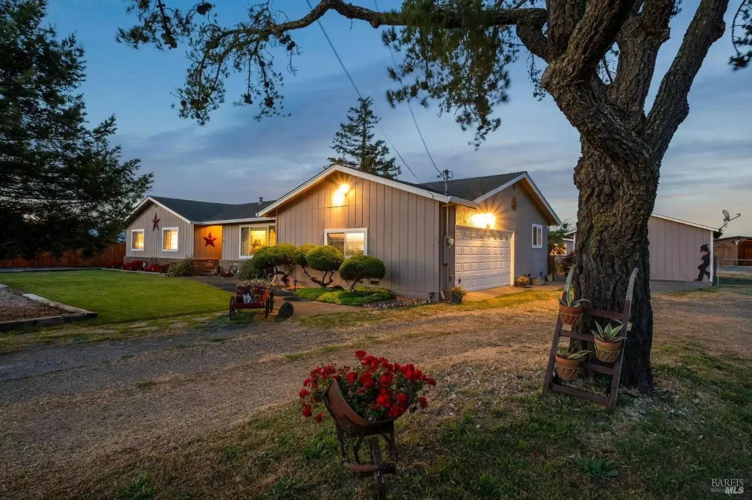 Driveway approach and garage at dusk