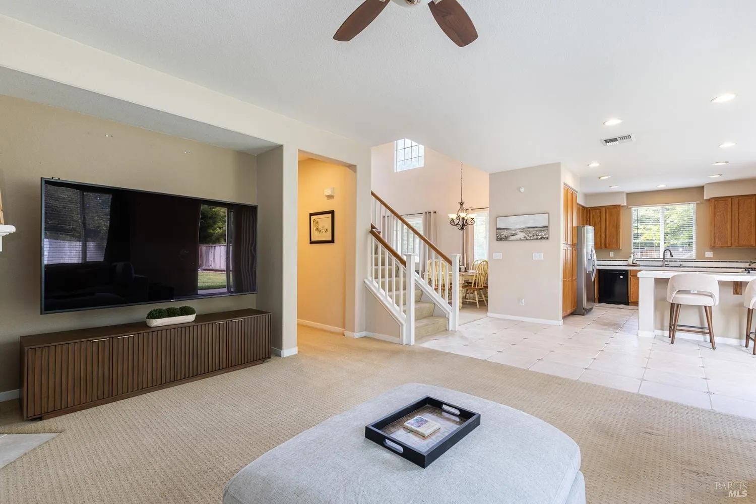 Open view from living area into kitchen and dining spaces