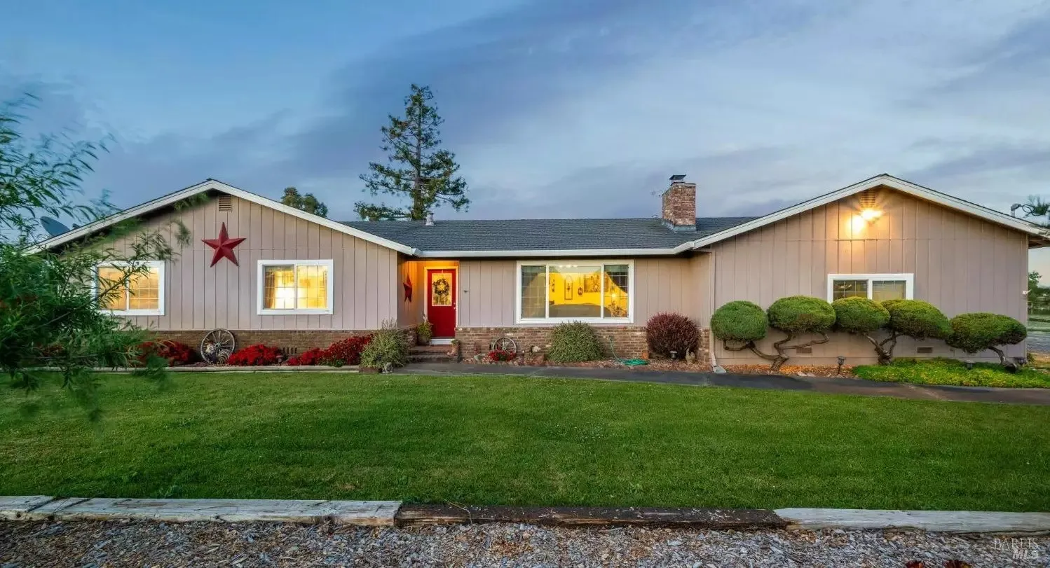 Dusk view of the single-level ranch home at 23180 Maffei Road